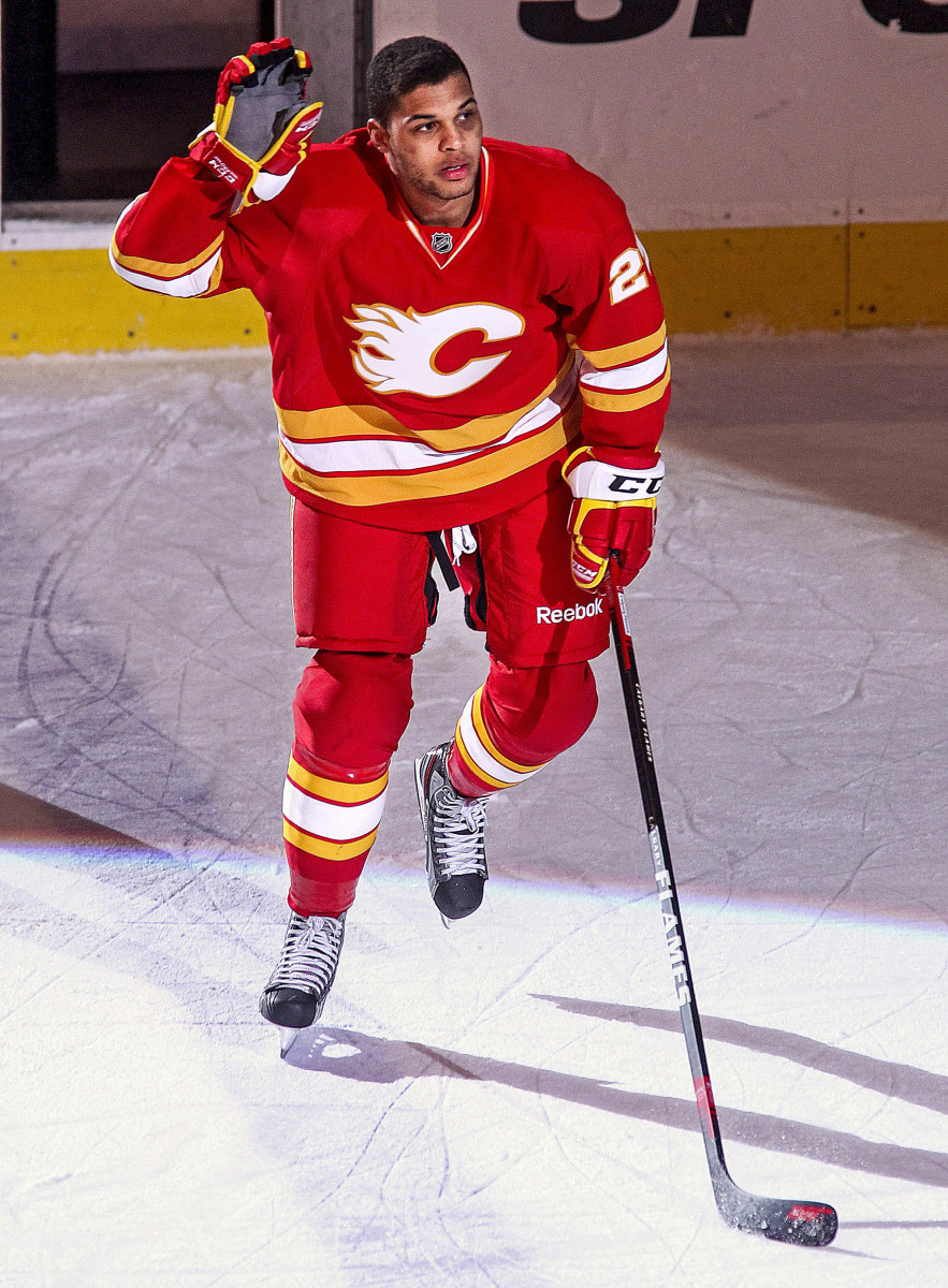 Aliu had two goals and an assist in his first two games for Calgary—but had to play without his Afro, which he shaved off to avoid standing out. 